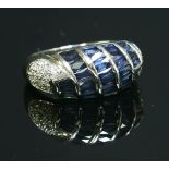 A Continental white gold, sapphire and diamond bombé ring,