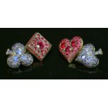 A pair of gold ruby and sapphire set playing card suit cufflinks,