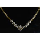 A Continental diamond set necklace,