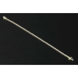 An 18ct gold diamond set line bracelet,