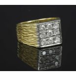 A gentlemen's two colour gold diamond set ring,