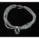 A French white gold aquamarine and diamond torsade necklace,