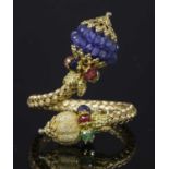 An Italian gold sapphire, ruby and emerald torque-style ring,