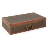 An early 20th century Louis Vuitton monogrammed suitcase