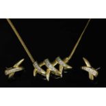 An American gold and diamond set kiss necklace and earrings suite,