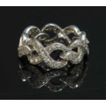 A gold diamond set chain link ring,