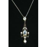 An Edwardian aquamarine, diamond and pearl pendant,