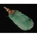 A Chinese carved nephrite gourd pendant,