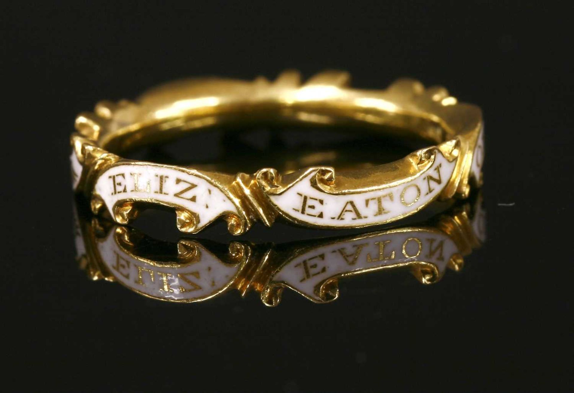 A Georgian white enamel memorial ring,