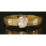 An 18ct gold ladies' Omega Ladymatic automatic bracelet watch,