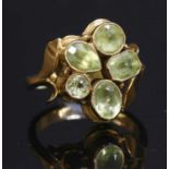An 18ct gold five stone peridot ring,
