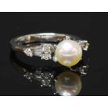 A Continental white gold single stone cultured pearl ring,