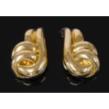 A pair of gold entwined swirl earrings,