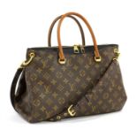 A Louis Vuitton monogrammed Pallas shopper bag