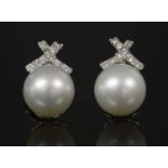 A pair of Continental white gold cultured South Sea pearl and diamond earrings,