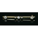 A five stone diamond bar brooch,