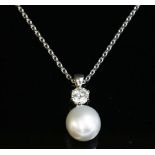 An 18ct white gold diamond and South Sea pearl pendant,