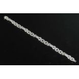 A white gold diamond set bracelet,