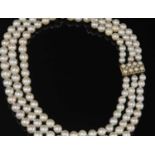 A three row graduated cultured pearl necklace,