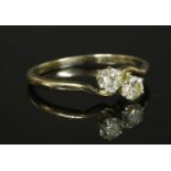 A two stone crossover ring,