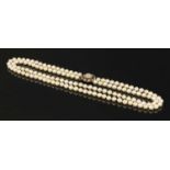 A two row uniform cultured pearl necklace,