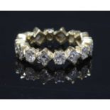 An 18ct gold diamond set full eternity ring,
