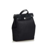 An Hermès black canvas 'Herbag' backpack,