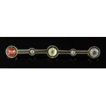 A gold and platinum sapphire, tourmaline and diamond bar brooch, c.1915,