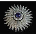 A late Victorian sapphire and diamond sunburst brooch/pendant, c.1890,