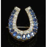 A late Victorian sapphire and diamond horseshoe brooch,