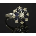 A white gold diamond and sapphire cluster ring, c.1970,