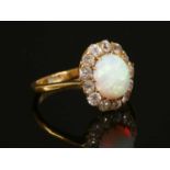 An opal and diamond cluster ring,