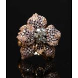 A two colour rose and white gold diamond set orchid ring,