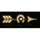 A late Victorian gold and split pearl arrow and horseshoe brooch,