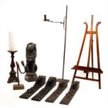 A carved softwood pricket candlestick,