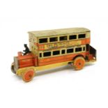 An early 20th century tinplate bus,