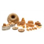 Fourteen various copper jelly moulds,