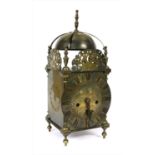 A 17th century style brass eight day lantern clock,
