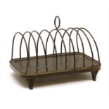 A Toleware toast rack,