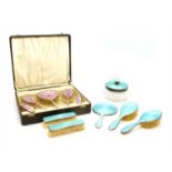 Silver mounted and enamelled dressing table items,