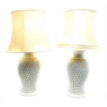 Two modern white pottery table lamps and shades,