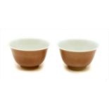 A pair of Chinese tea cups,