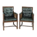 A pair of oak bergère armchairs,