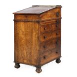 A narrow Regency period rosewood davenport desk,