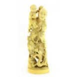 A Japanese carved ivory group,