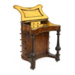 A Victorian walnut davenport,