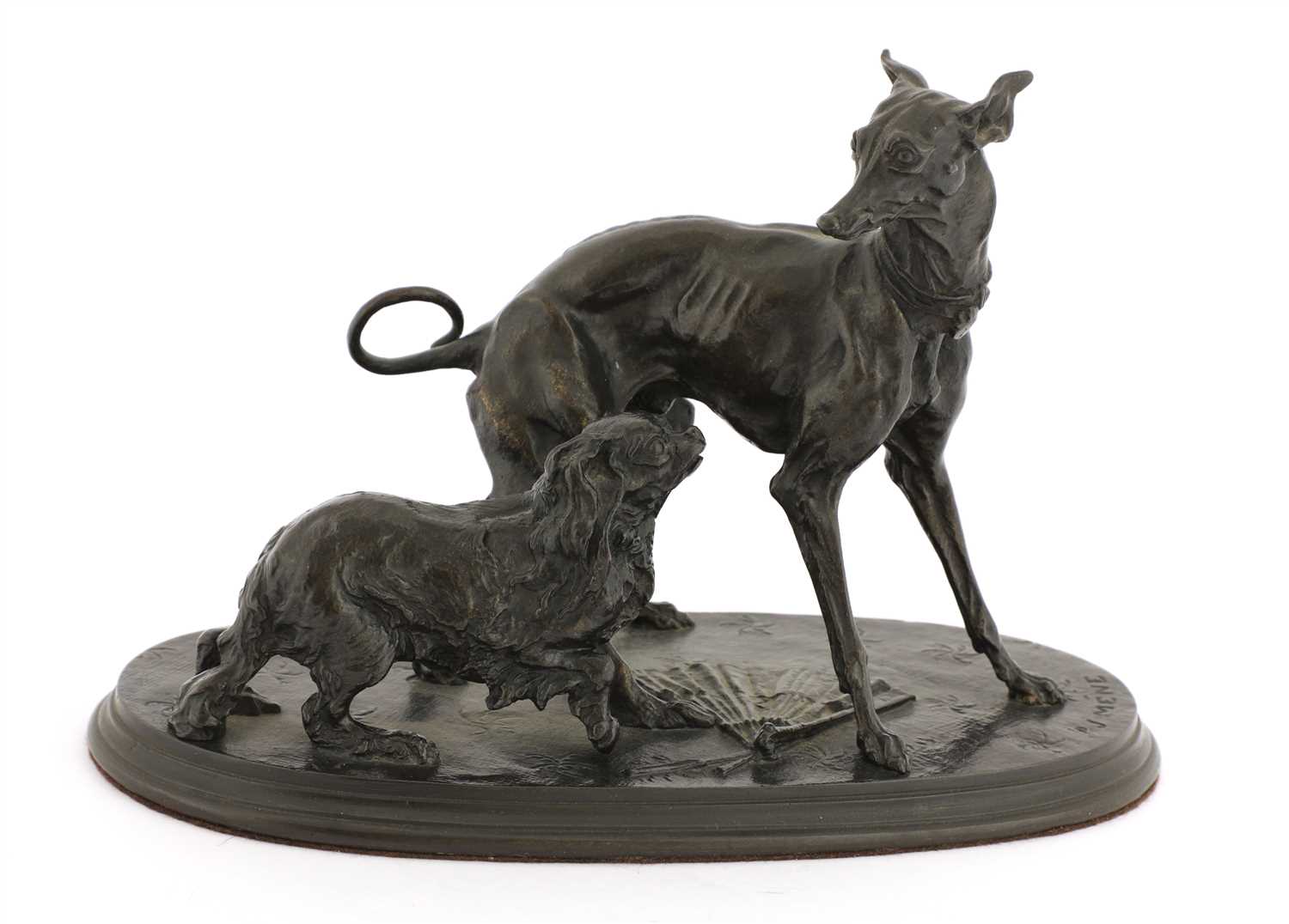A patinated iron group of a greyhound and a King Charles spaniel,