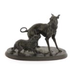 A patinated iron group of a greyhound and a King Charles spaniel,