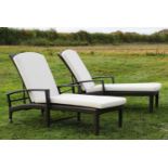 A pair of Dedon woven sun loungers and cushions,