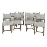A set of eight walnut Gothic Revival dining chairs,
